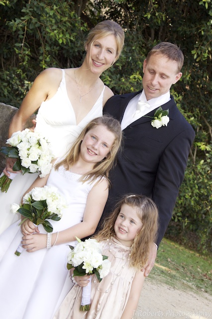 Bride and groom with flower girls - wedding photography